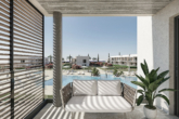 Modern new construction: penthouse with roof terrace and communal salt water pool - View