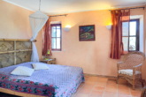 Charming finca with pool and guest house near Artà - Bedroom with...