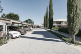 Moderner Neubau: EG-Eck-Wohnung mit Garten und gemeinschaftlichen Salzwasserpool - Parkplatz mit Elektroladestation