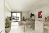 Modern new building: corner ground floor flat with garden and communal salt water pool - ...livingroom and dining area
